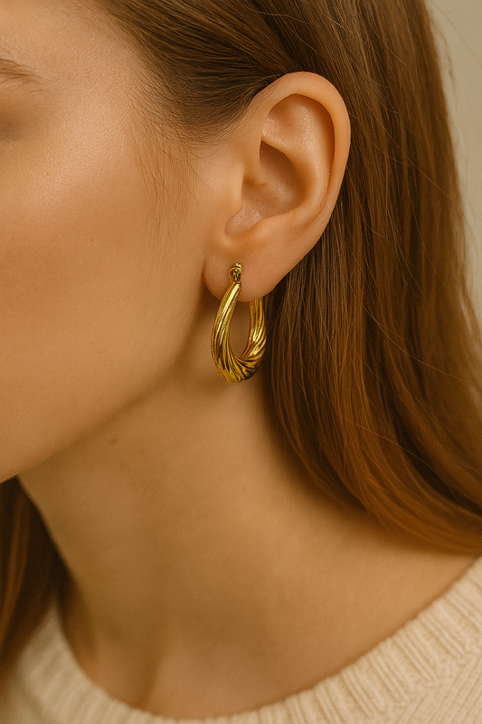 ARETE ARGOLLA DORADA SEMI OVALADA CON RELIEVE TRENZADO F4975