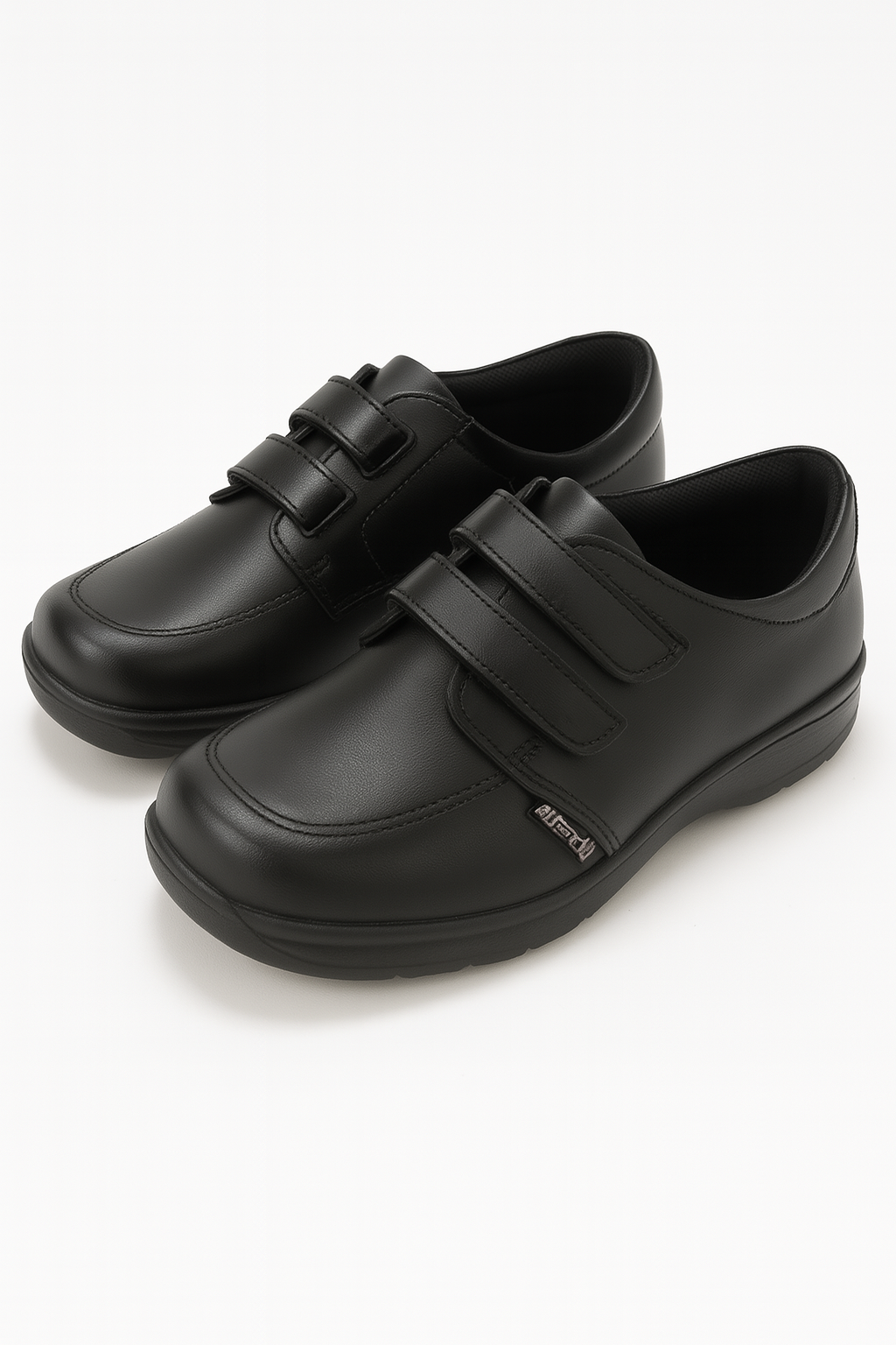 ZAPATOS ESCOLARES NEGROS DE CUERO CON ABERTURA AJUSTABLE DE VELCRO