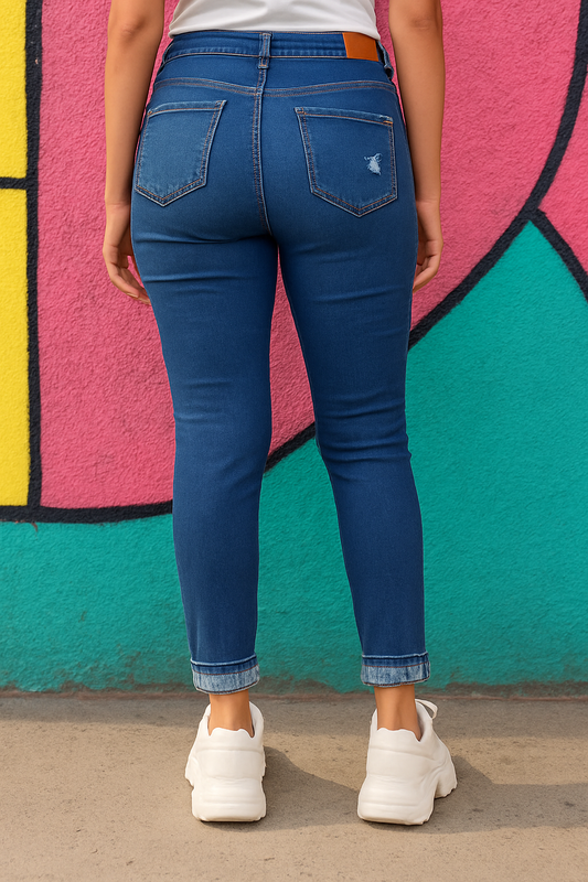 JEAN SKINNY DAMA AZUL OSCURO CON ROTO Y DOBLADO EN LA TOBILLERA