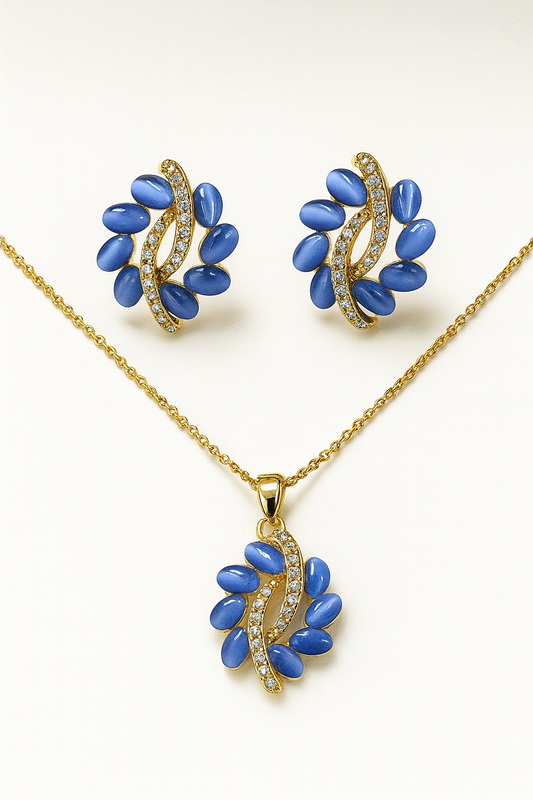 SET DE ARETES Y COLLAR DORADO CON GOTAS AZULES Y DISEÑO DE CURVA CON DIAMANTES M2056